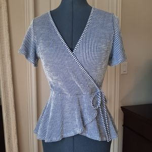 Faux wrap blue and white top